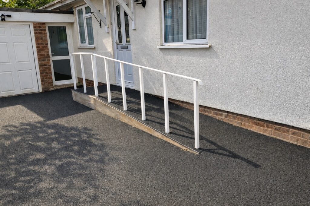 Wheelchair ramp providing level access to a residential home entrance in Wellesbourne.