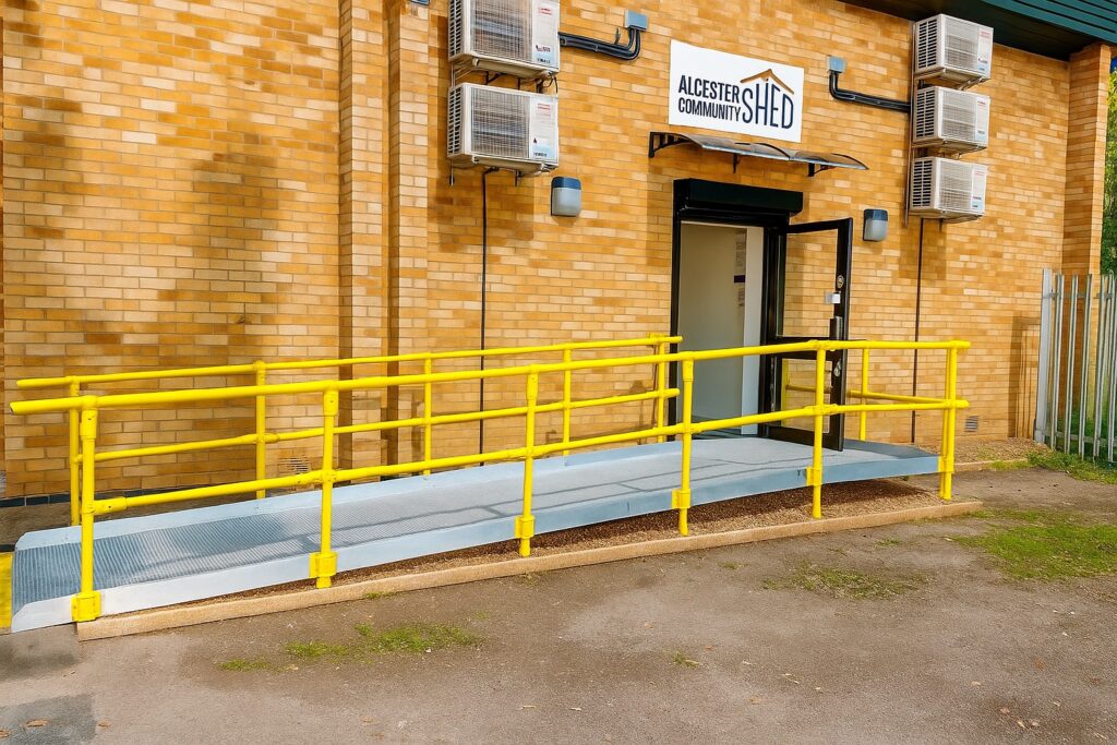 Bespoke modular ramp with safety handrails installed at a community centre in Alcester.