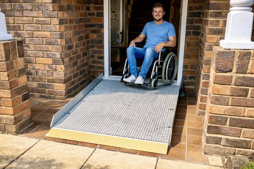 Threshold wheelchair ramp providing step-free access to a front door at a residential property in Moreton-in-marsh.
